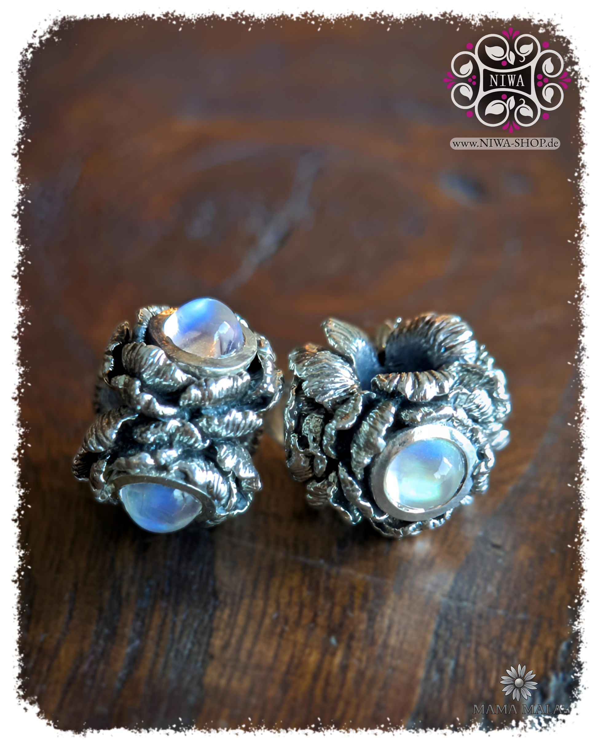 POPPY BLOOM charm made of solid 925 sterling silver with 3x Blue Moonstone cabochons, two charms in group view on wood, MAMA MALA by NIWA