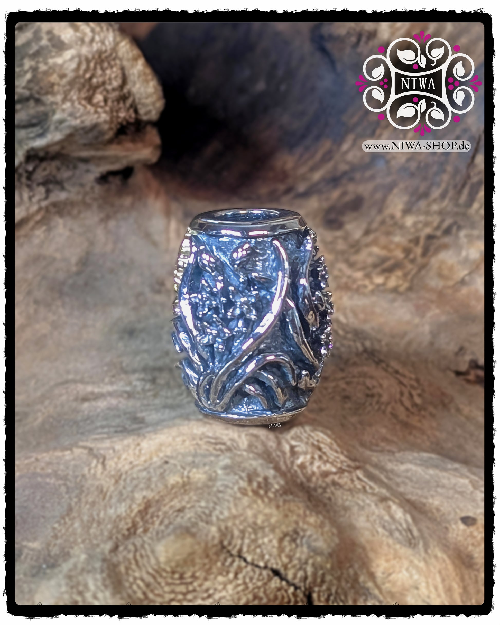 Seitenansicht des CHINESE LOVE BarrelCharm aus 925 STERLINGSILBER, geschwungene ORCHIDEENRANKEN bilden einen bogenförmigen Durchgang ohne Schriftzeichen.