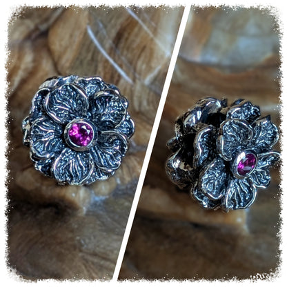 VIOLET GARNET FORGET ME NOT Charm, NIWABEADS FLORAL GLORY, solid 925 STERLING SILVER, collage with front view and slanted side view, violet GARNET in diamond cut cut in setting, slightly rosy shimmer depending on the light, deep contrasts in the recesses, solid floral shape.