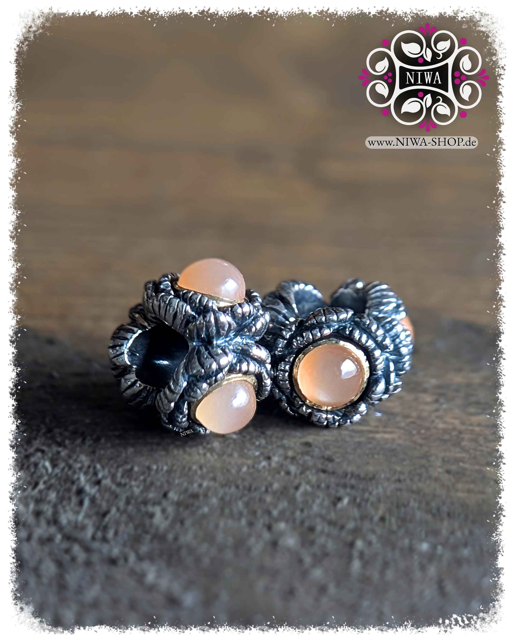 BABY PEONY BLOOM MiniCharm Cabochon Edition with Peach Moonstone, two MiniCharms in group view on wooden surface by NIWABeads